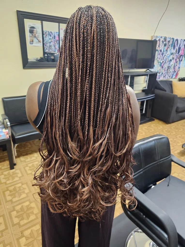 Waist-length knotless braids with curly ends — Gege Hair Salon, Schaumburg